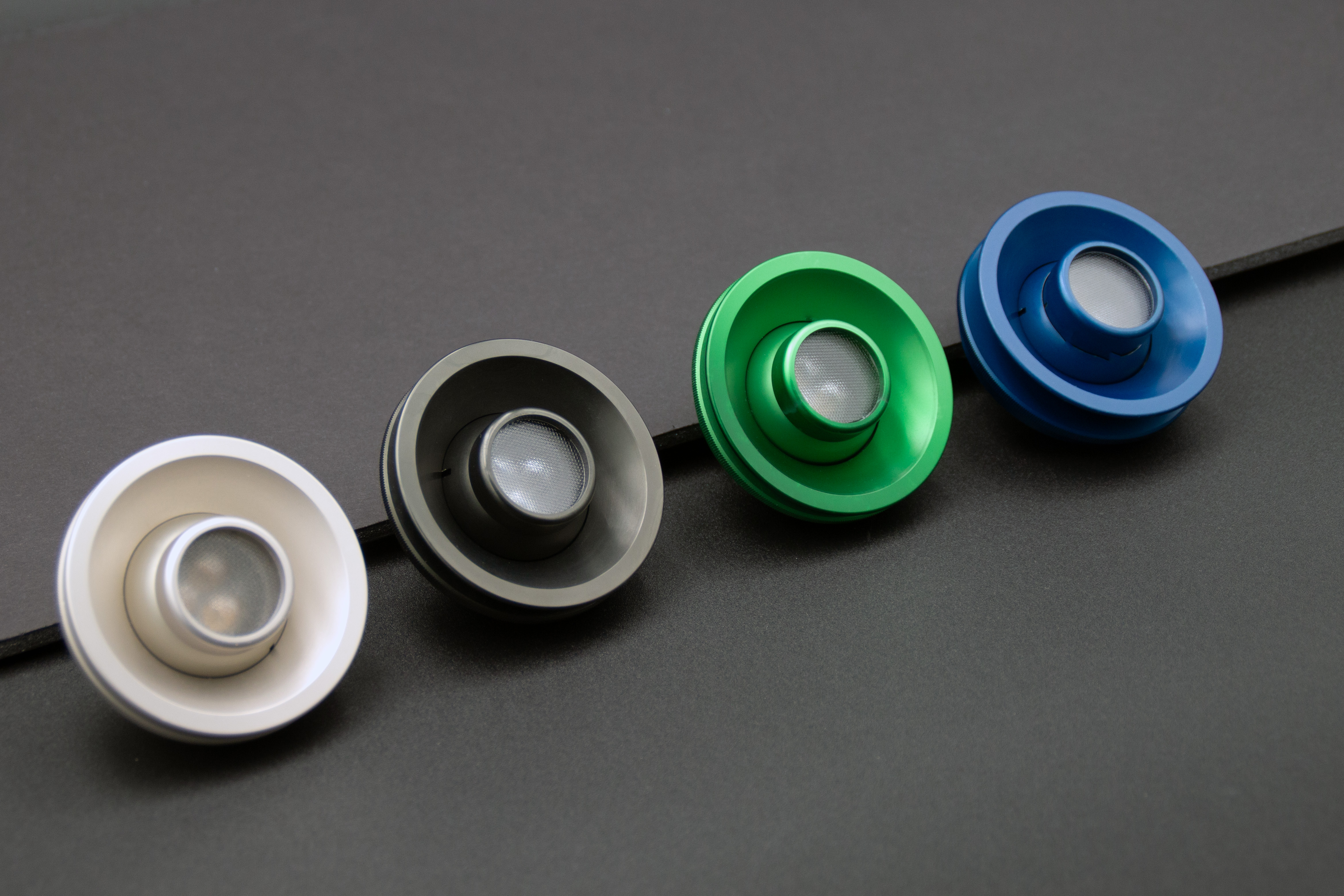 PWI custom LED reading light anodized finish color options PWI custom LED reading lights in white, black, green, and blue anodized finishes
