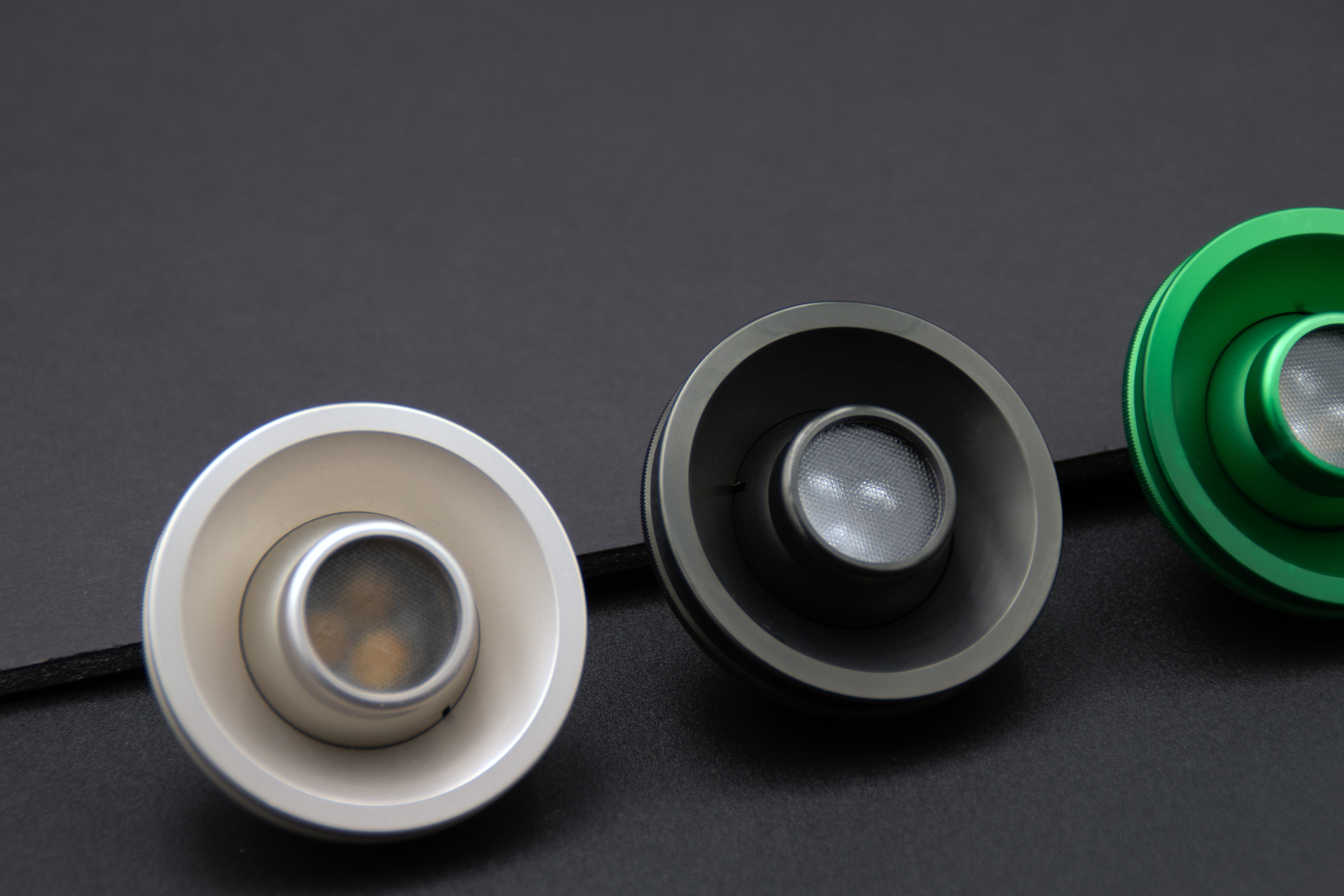 PWI custom LED reading lights in black, green, and blue anodized finishes PWI custom LED reading lights in black, green, and blue anodized finishes